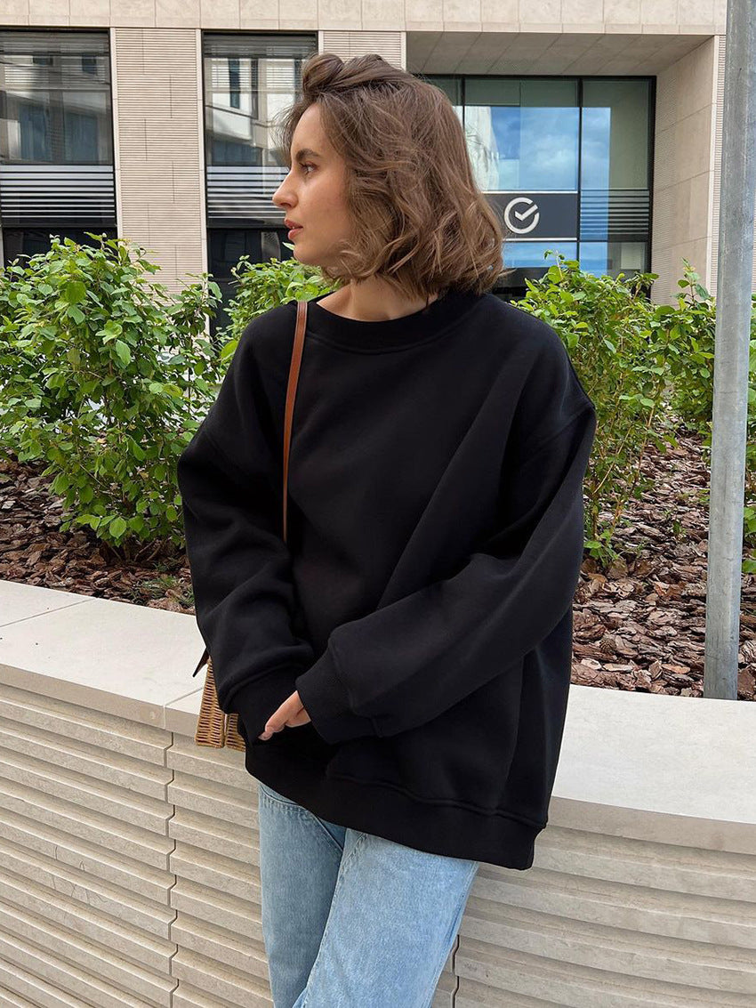 Woman Oversized sweatshirt with a relaxed fit and modern chic accents and style