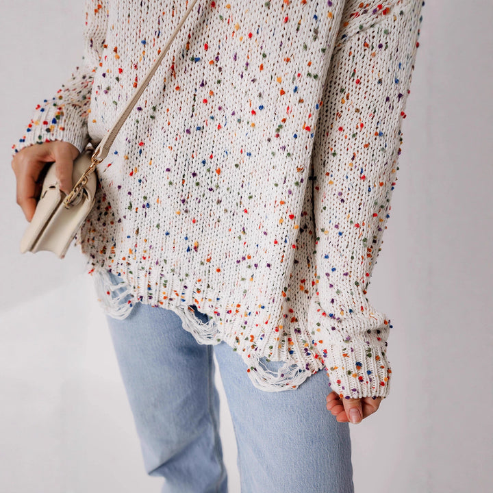Casual knitted sweater for women with a colorful splatter design and a comfortable round neckline Lune London
