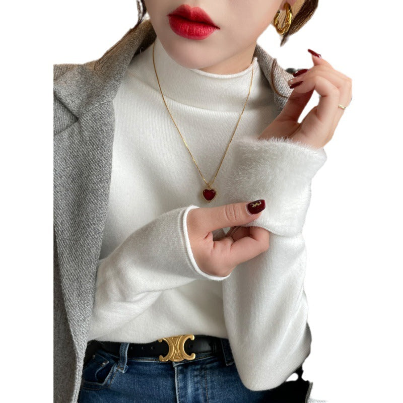 Pull élégant à col roulé pour femmes en matériau doux Chic & Stil