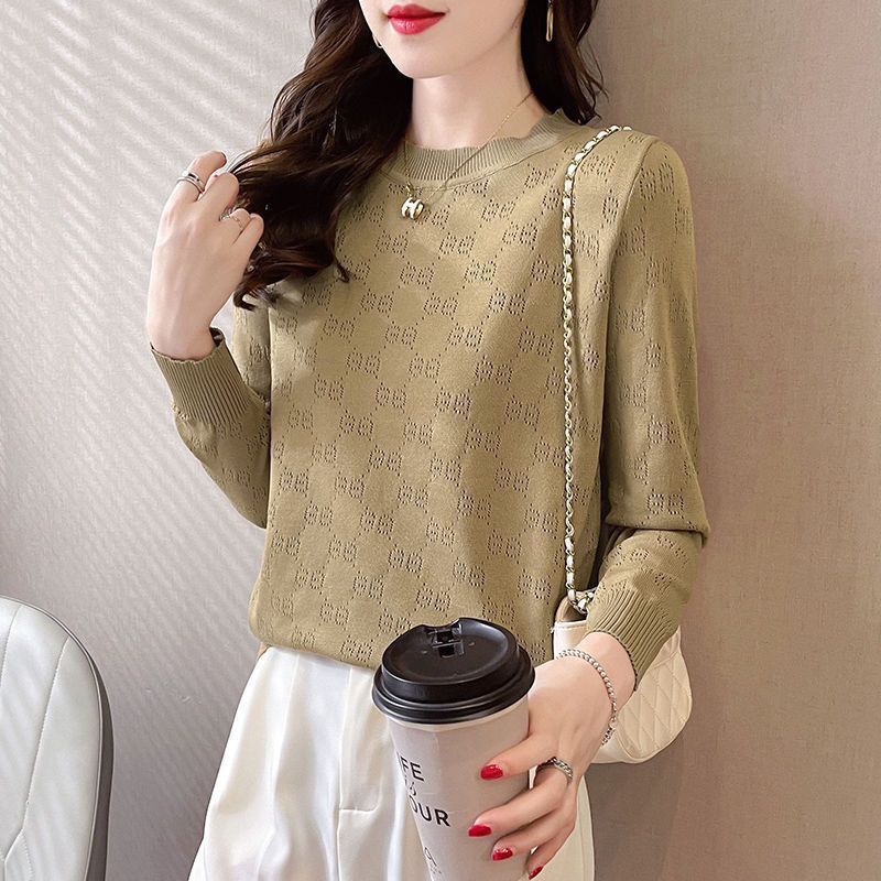 Pull en maille pour femmes avec une texture élégante en motif œillet Chic & Stil
