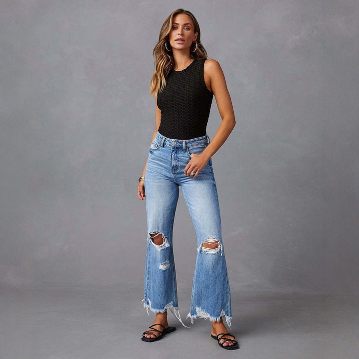 Women's Flared Jeans with Stylish Ripped Details and Frayed Hems Lune London