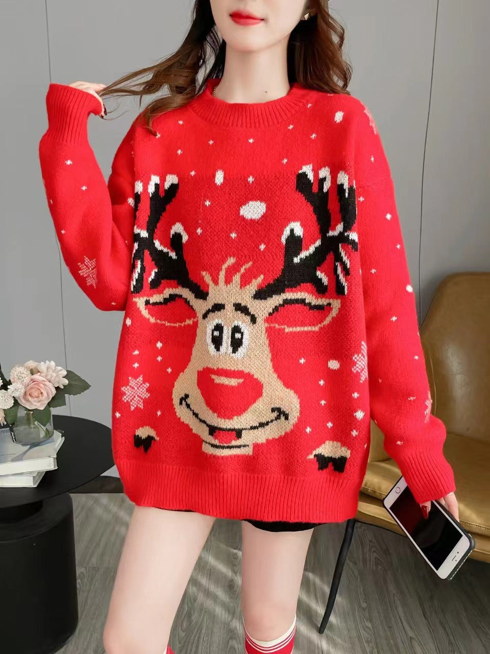 Christmas women's sweater with a unique reindeer pattern Lune London
