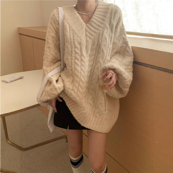 Pull en tricot pour femmes avec motif en câble texturé et manches volumineuses Chic & Stil