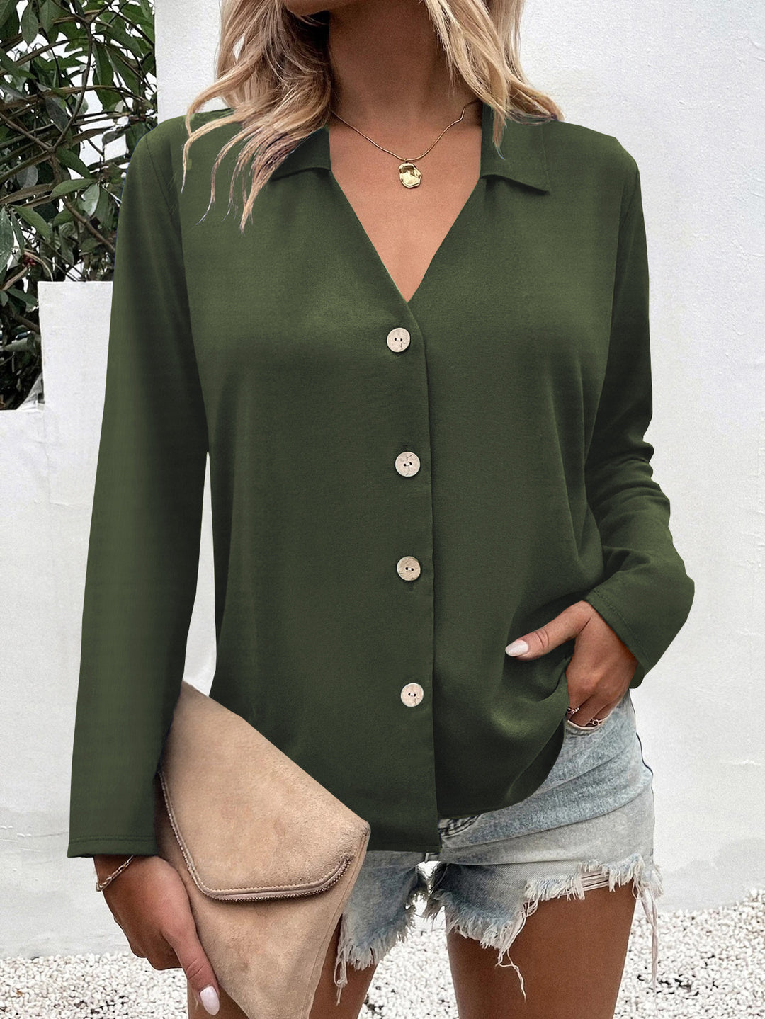 Trendy women's blouse with V-neck and button details Lune London