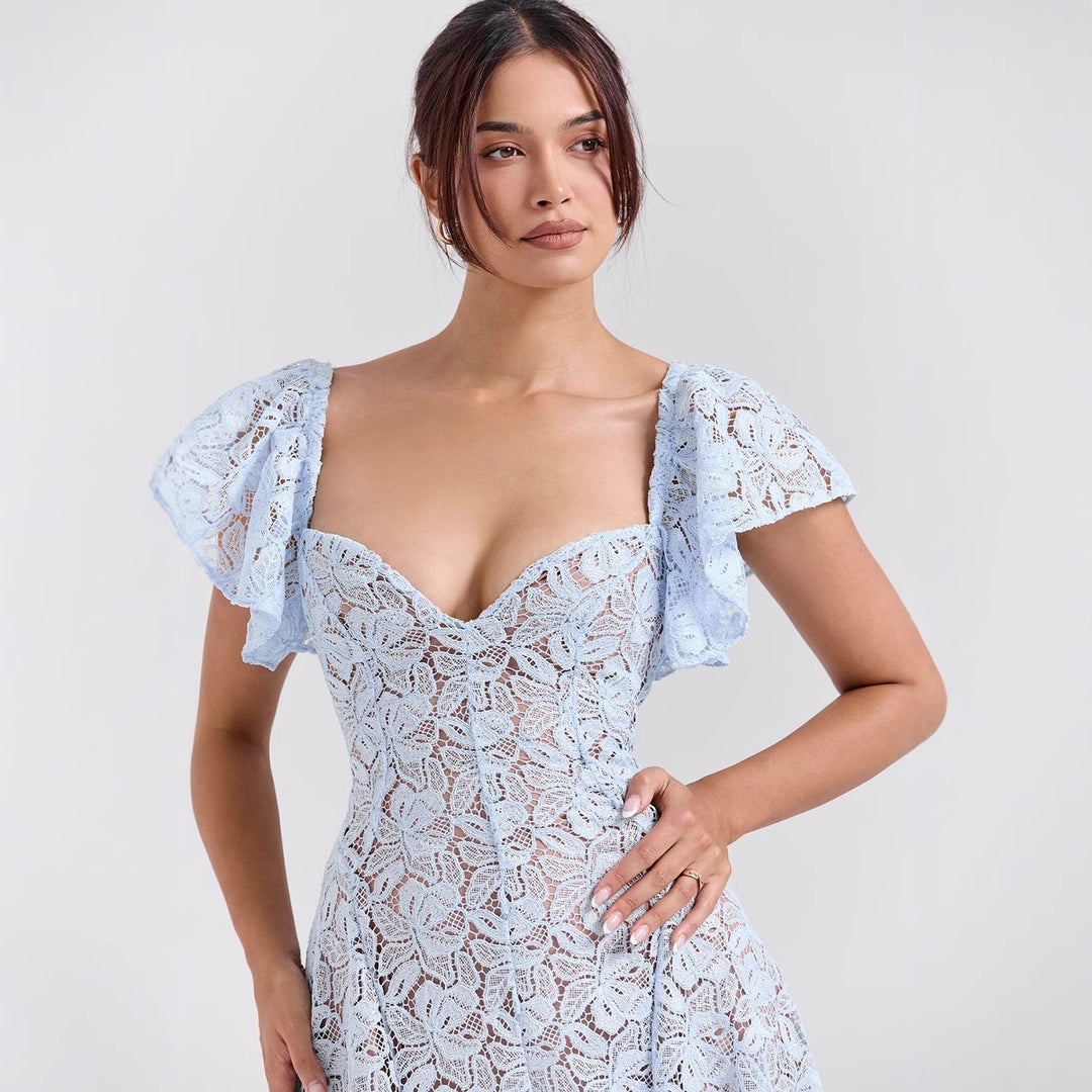 Maxi lace dress for women with voluminous ruffles and a subtle heart-shaped neckline Chic & Stil