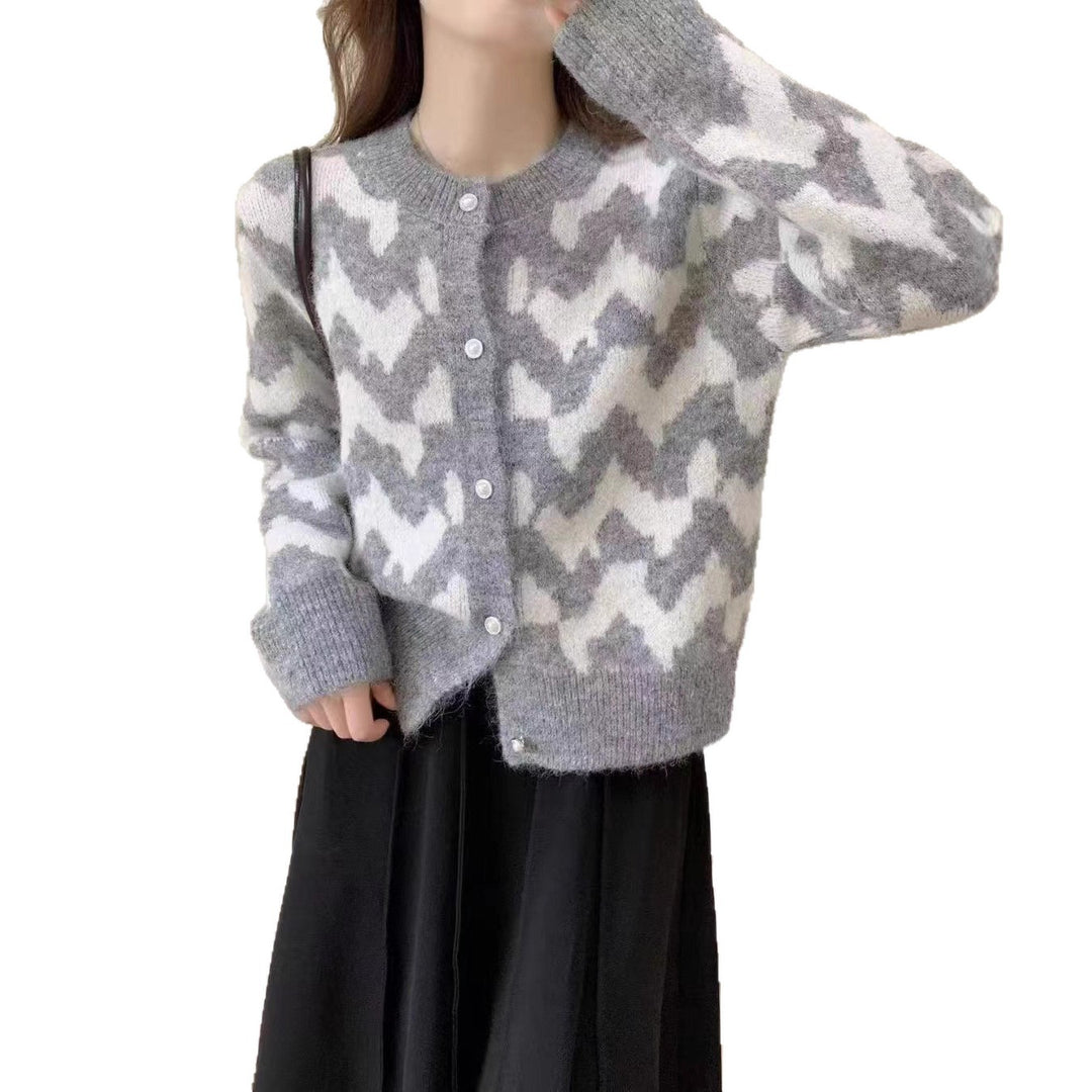 Women's knit jacket with a modern zigzag pattern and decorative buttons Lune London