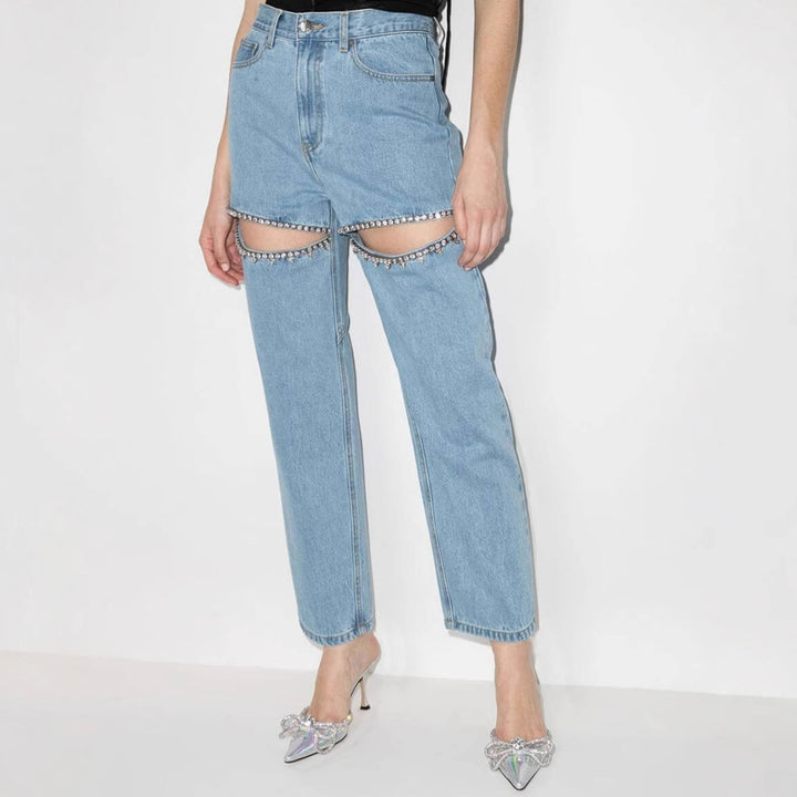Women's jeans with decorative cutouts and rhinestone accents Lune London