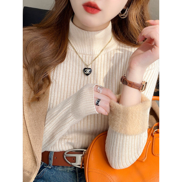 Pull femme avec col roulé et ourlet moelleux luxueux Chic & Stil
