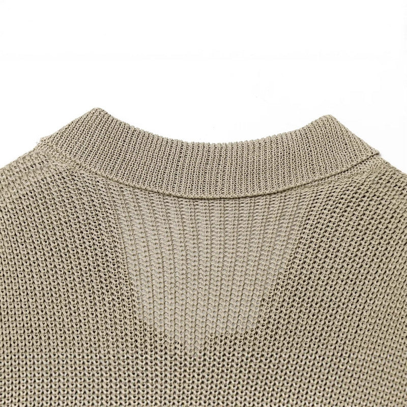 Women's knit jacket with elegant buttons and textured surface Lune London