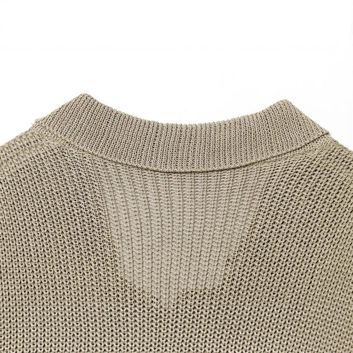 Women's knit jacket with elegant buttons and textured surface Lune London
