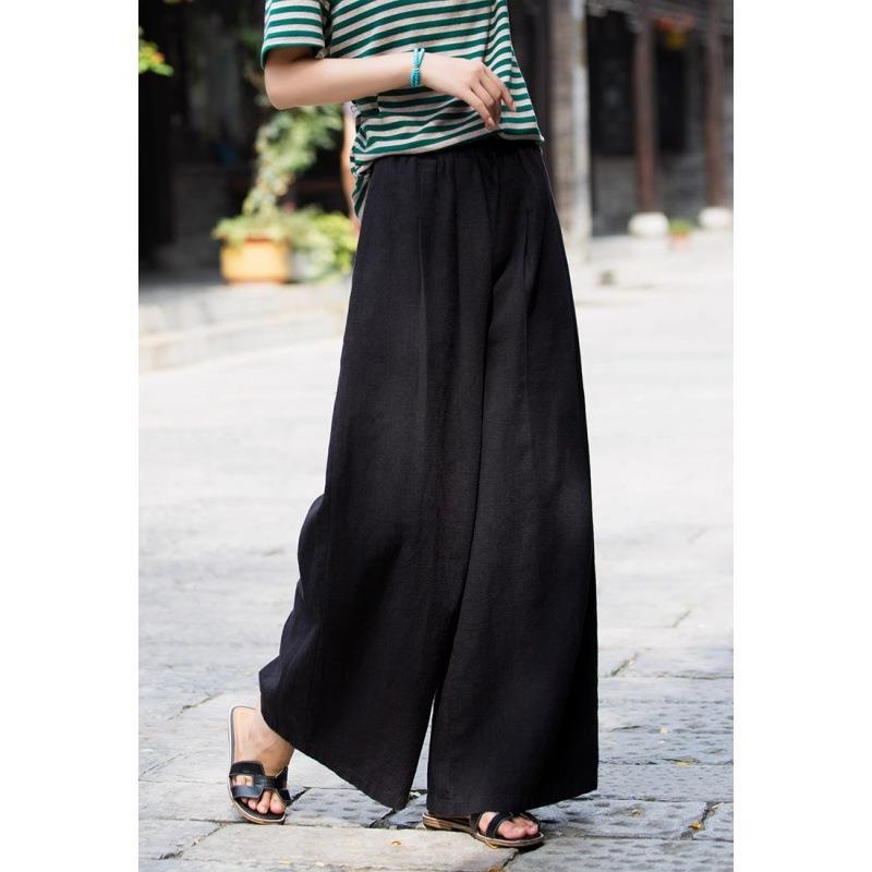 Linen trousers for women in loose fit with elastic waistband and practical pockets Lune London
