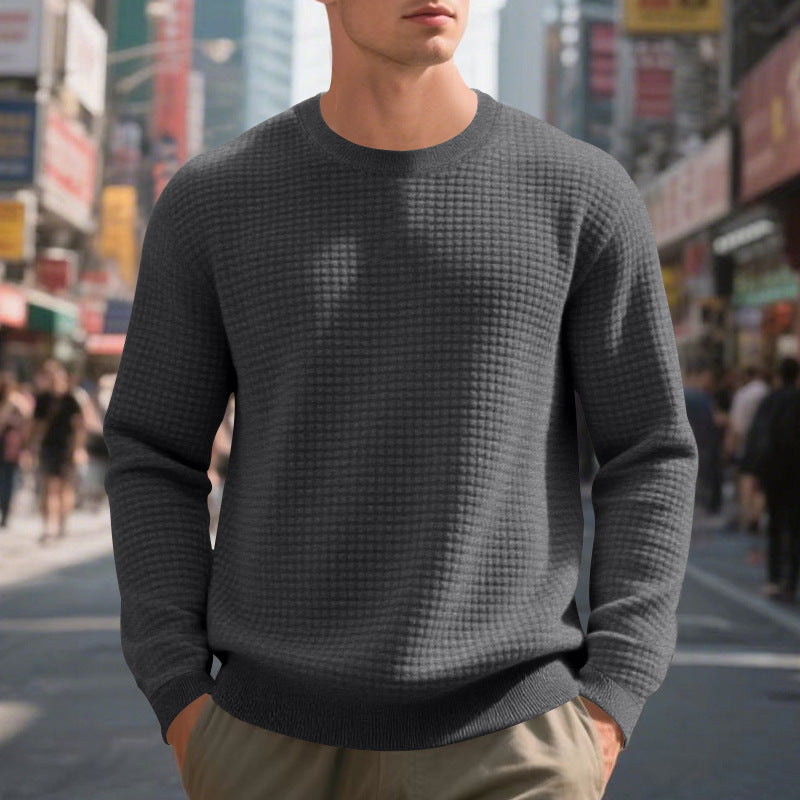Elegant structured knit sweater for men with a round neck and comfortable feel. Chic and style