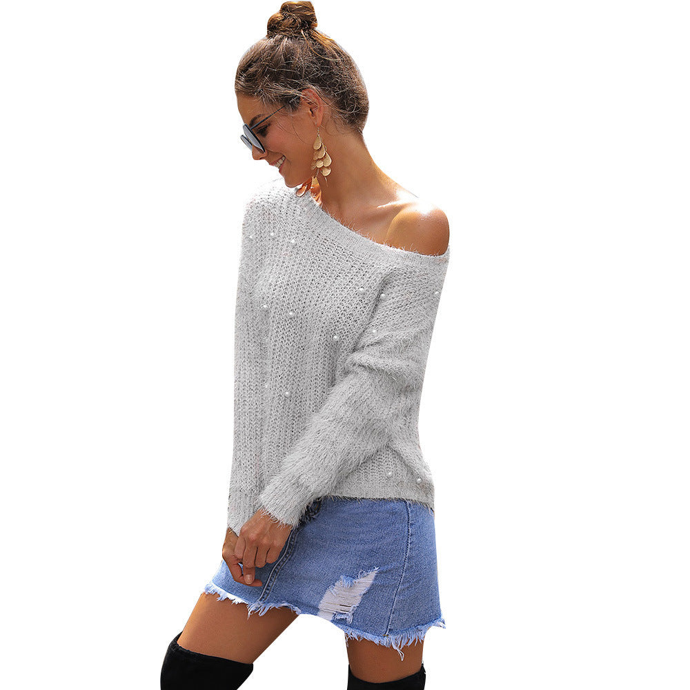 Ladies elegant and casual sweater with off-shoulder design and pearl embellishment Lune London