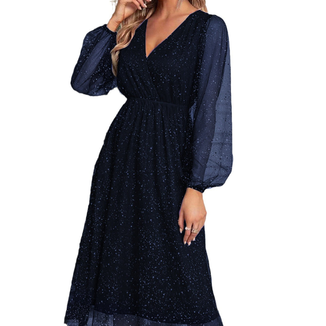 Glamorous midi dress for women with transparent puff sleeves and a sparkling sequin pattern Lune London