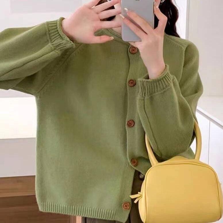 Knitted jacket for women with asymmetrical cut and generous balloon sleeves Lune London