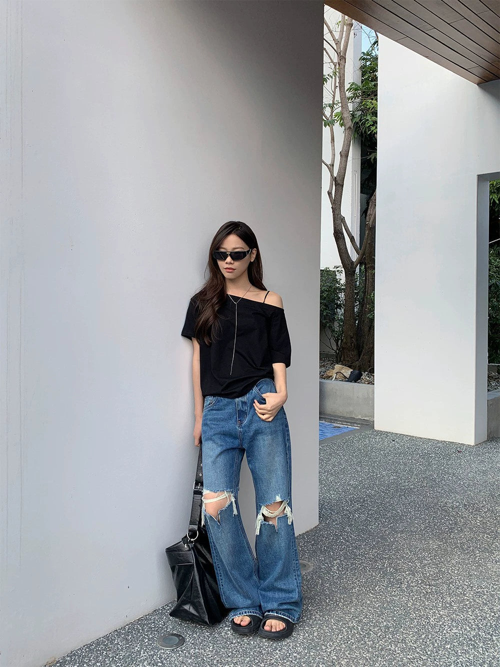 Women’s ripped wide jeans with cut-out details Lune London