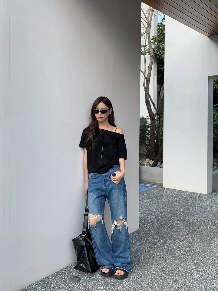 Women’s ripped wide jeans with cut-out details Lune London