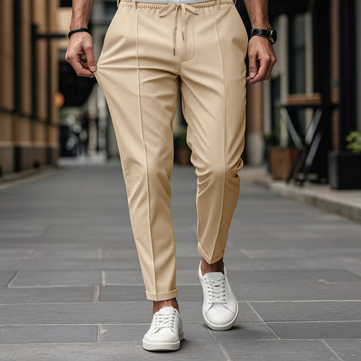 Men's fashionable sports pants with elastic waistband and practical welt pockets Lune London