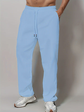 Men's Sporty Relaxed Fit Jogging Pants with Elastic Waistband and Side Pockets Chic & Stil