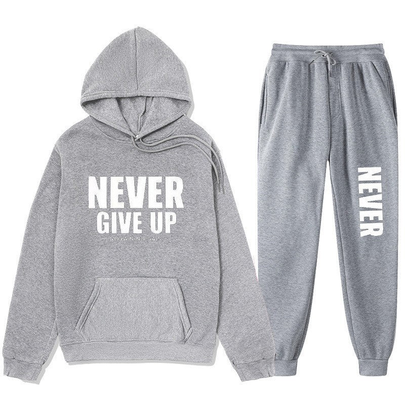 Women's training pullover and jogging pants in motif set with motivating print Chic & Stil