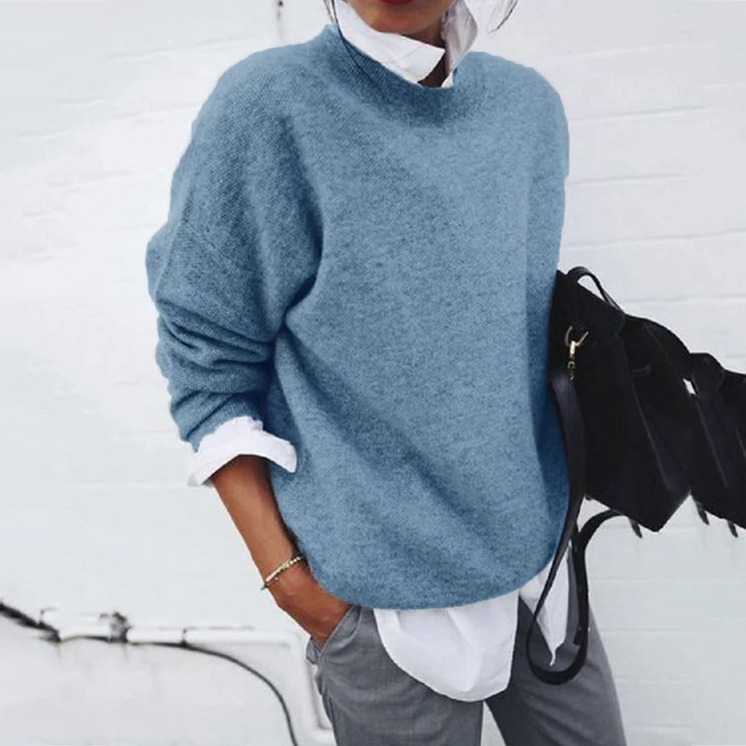 Pull féminin doux à col rond en mélange de tricots fins Chic & Stil