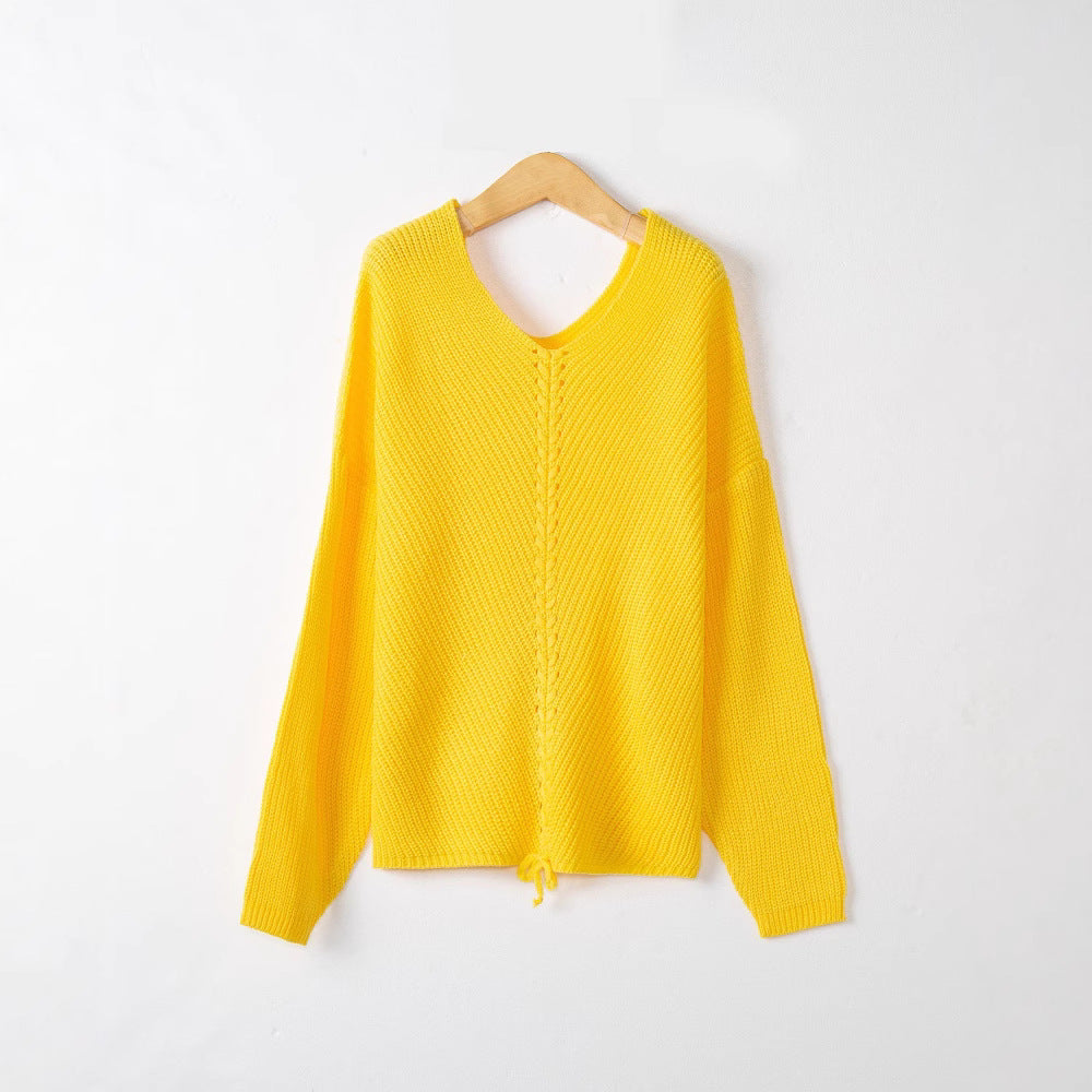 Women's thick knit sweater with an attractive V-neckline and practical drawstring details Lune London