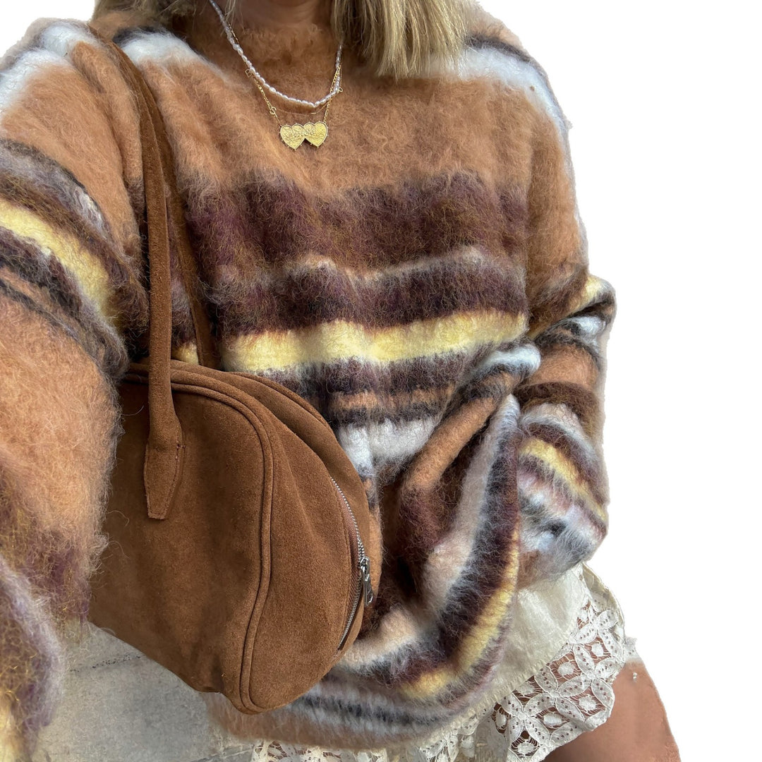 Oversized knitted sweater for women with modern striped patterns and a casual fit Lune London