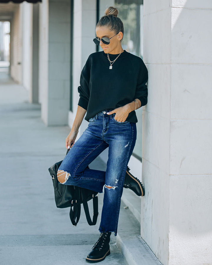 Modern high-waisted jeans for women with a chic and stylish worn look