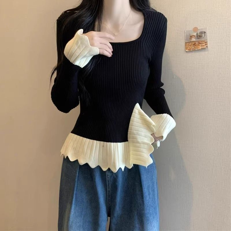 Pull en tricot côtelé à la mode pour femmes avec ourlet asymétrique Chic & Stil