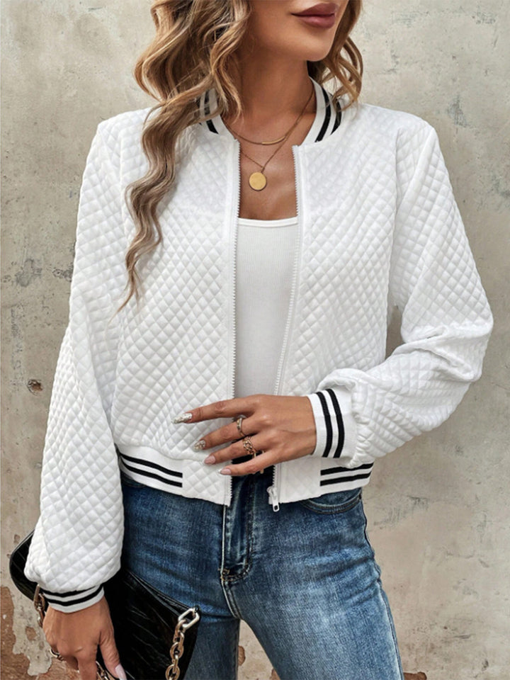 Veste matelassée femme au design sportif avec des manches contrastées Chic & Stil