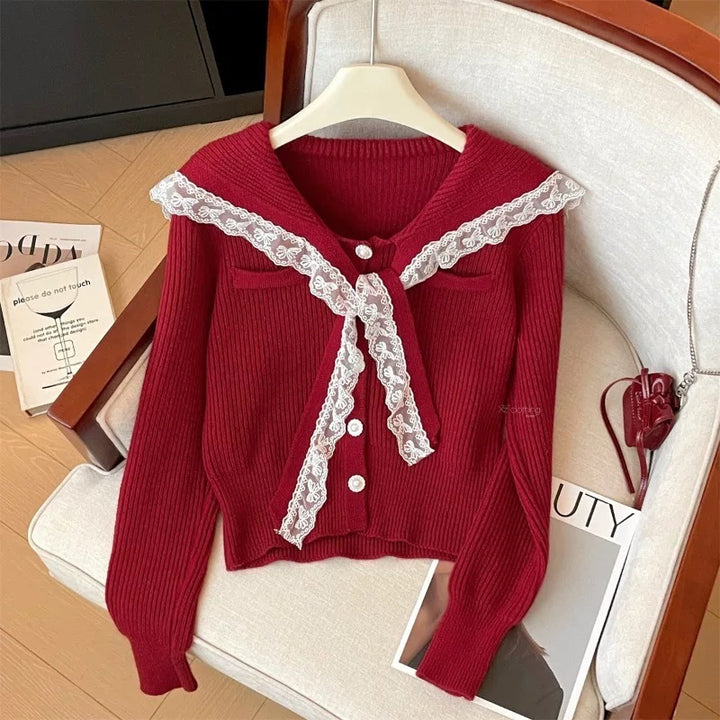 Knitted jacket for women with ruffled collar and decorative buttons Lune London