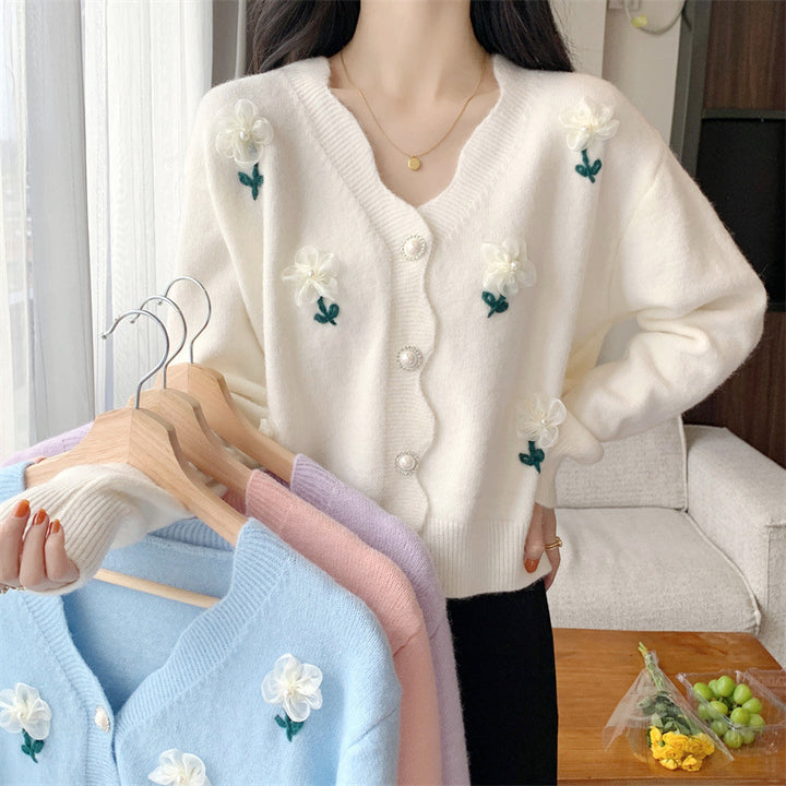 Playful women's cardigan button with floral embroidery and pearl buttons Lune London