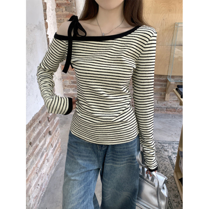 Women's asymmetrical long-sleeve shirt with stylish strap detail Chic & Stil