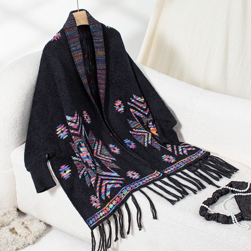Wool poncho for women with colorful Navajo pattern and fringed hem Lune London