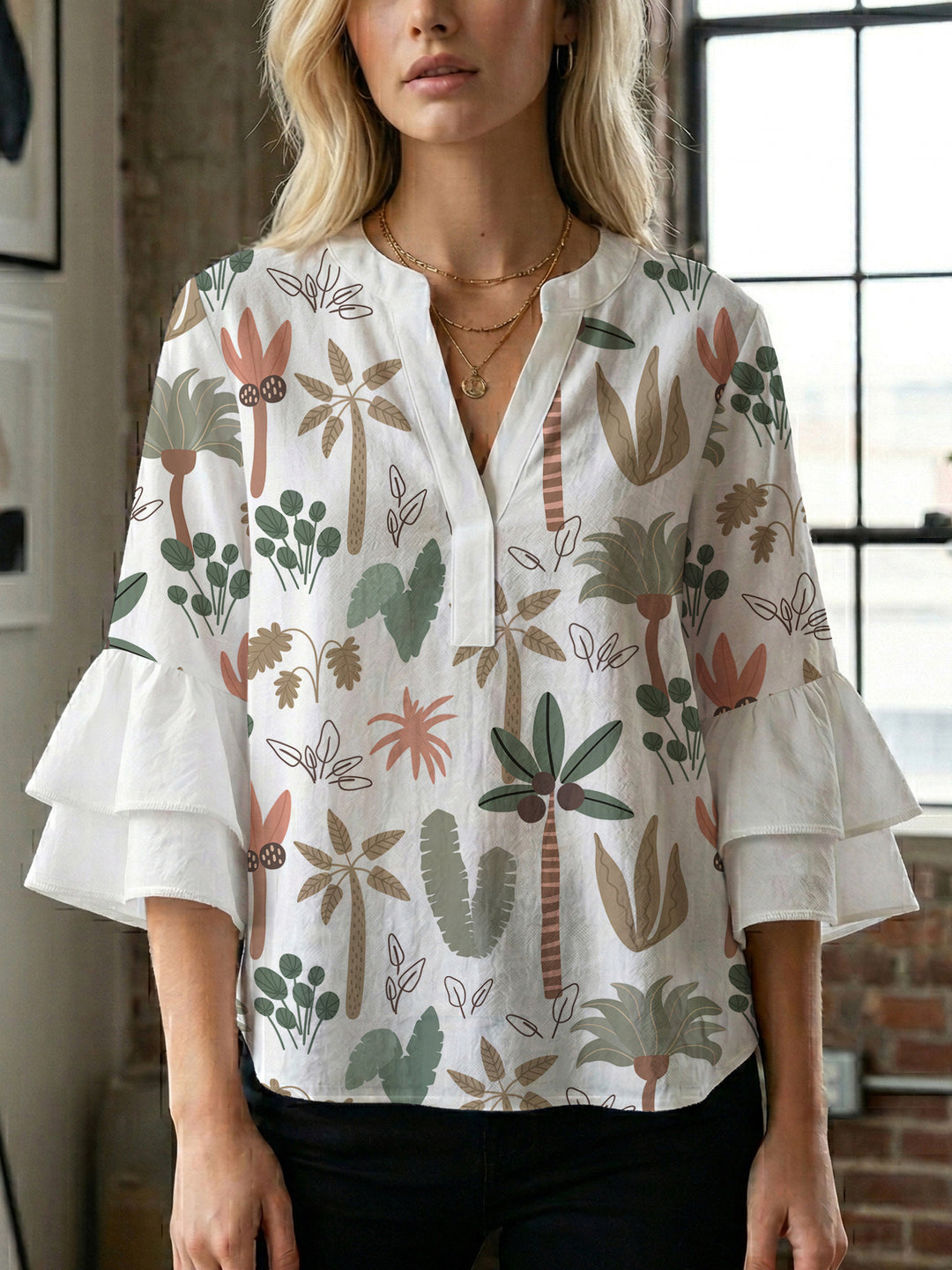 Women's blouse with ruffle details and eye-catching animal print Lune London