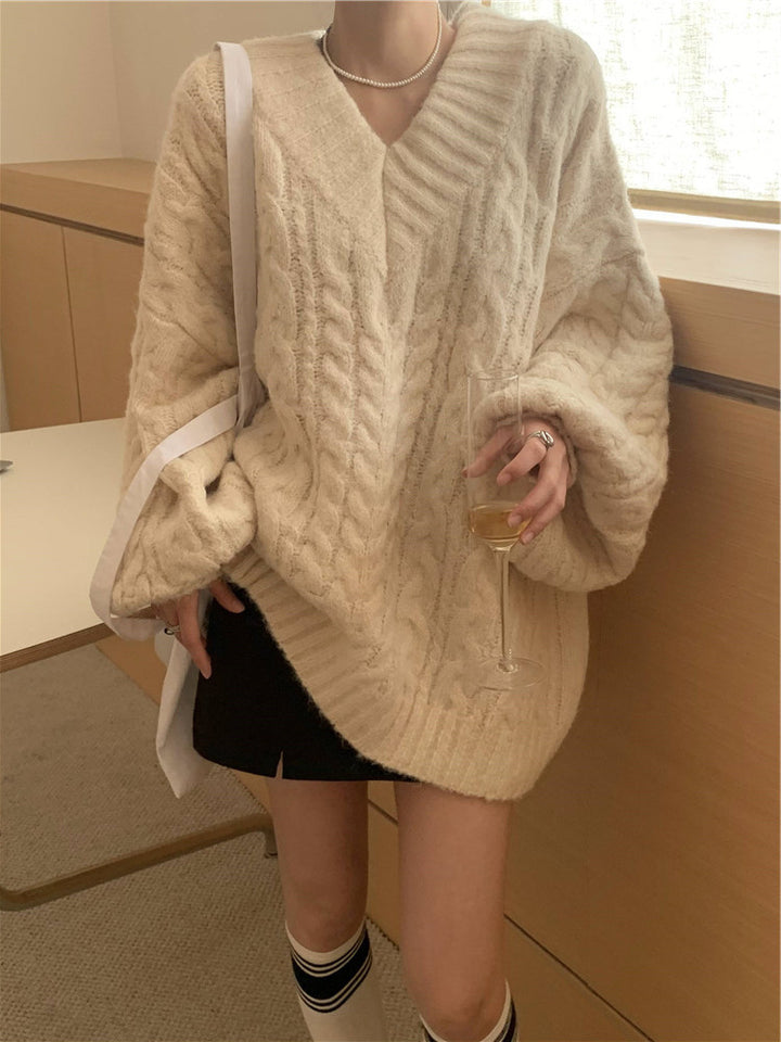 Pull en tricot pour femmes avec motif en câble texturé et manches volumineuses Chic & Stil