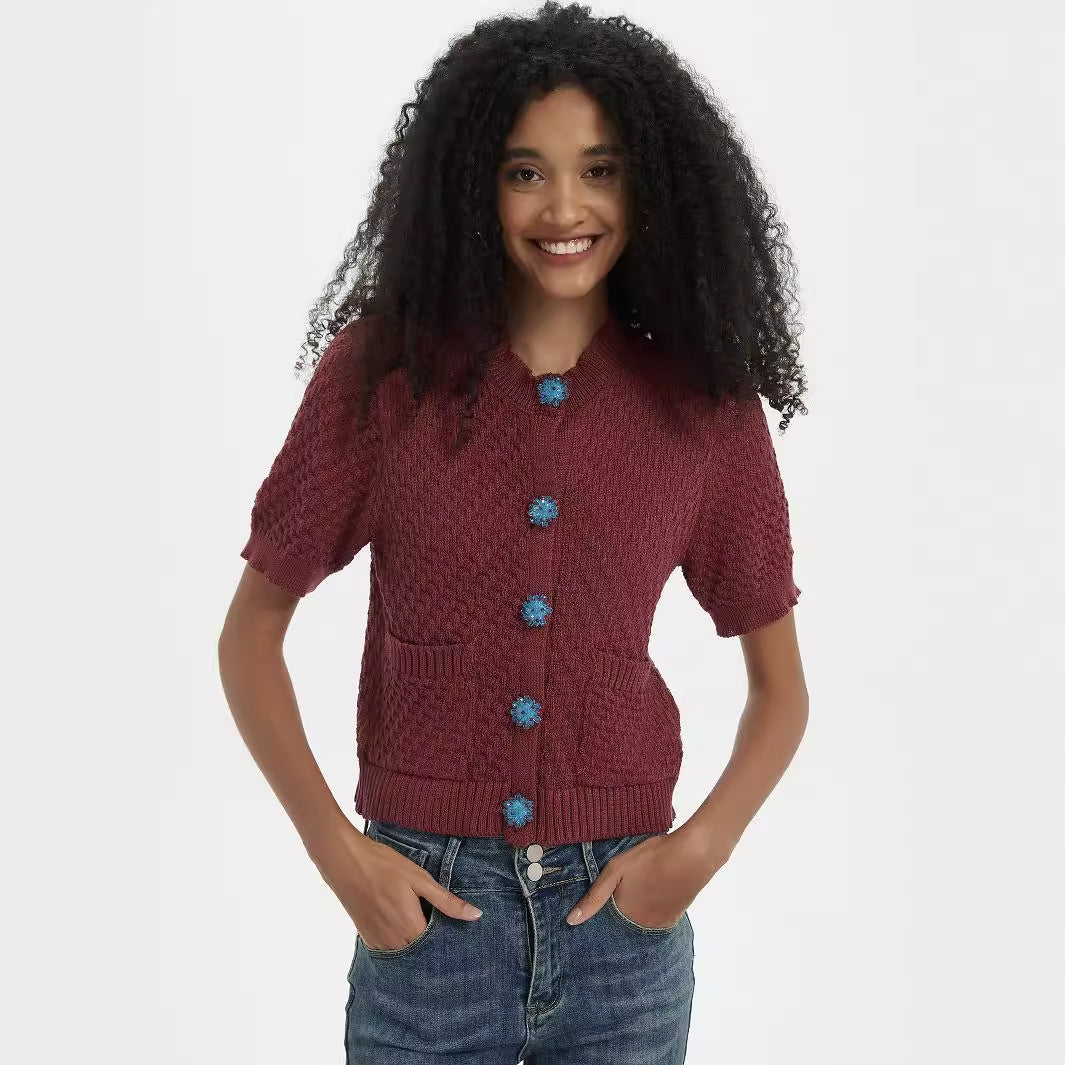 Knit jacket for women with an elaborate textured pattern and decorative buttons Lune London