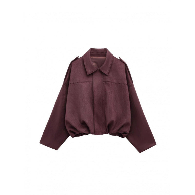 Trendy oversized jacket for women with hidden belt and chic shoulder details