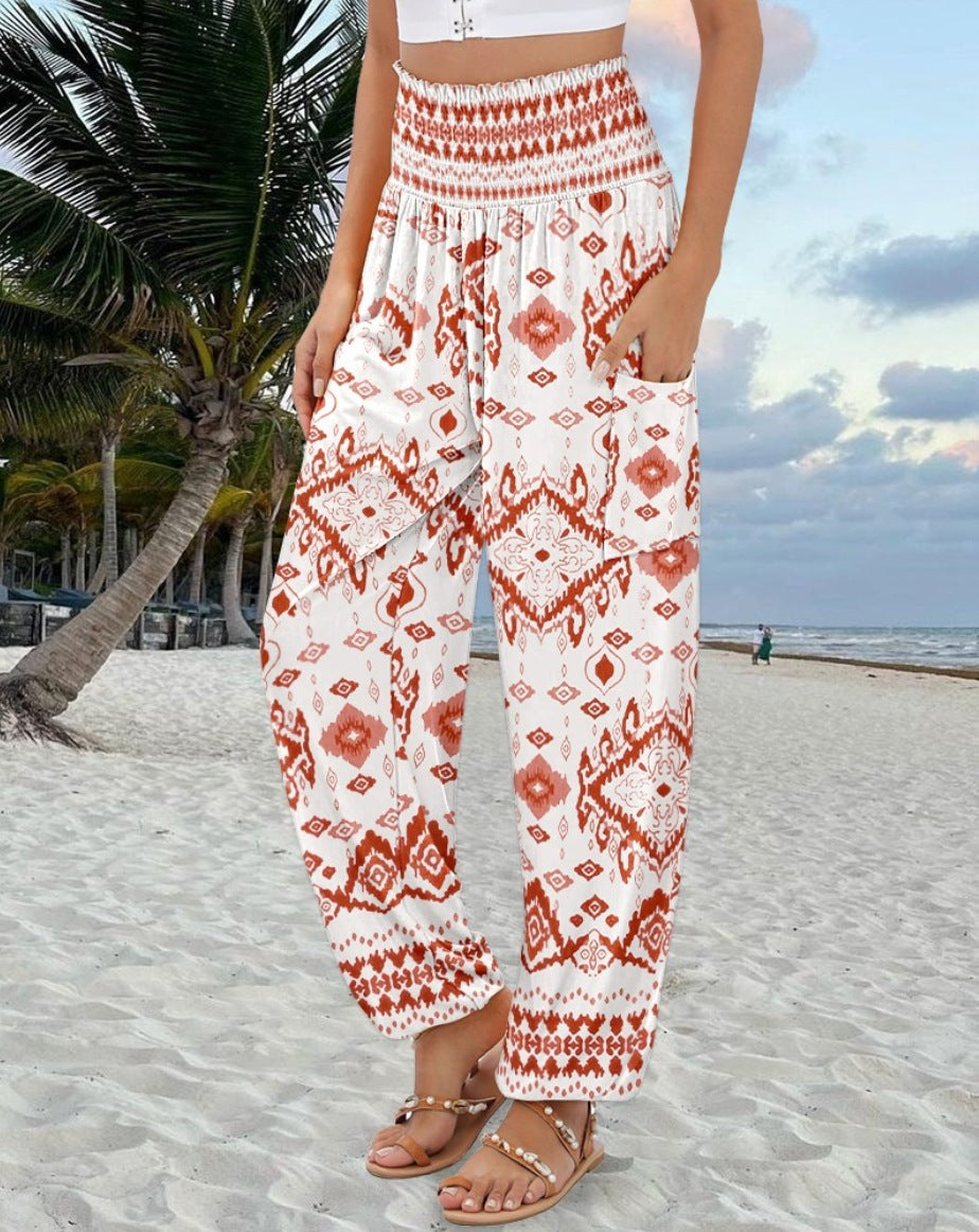 Wide Palazzo pants for women with colorful Paisley pattern and elastic waistband Lune London