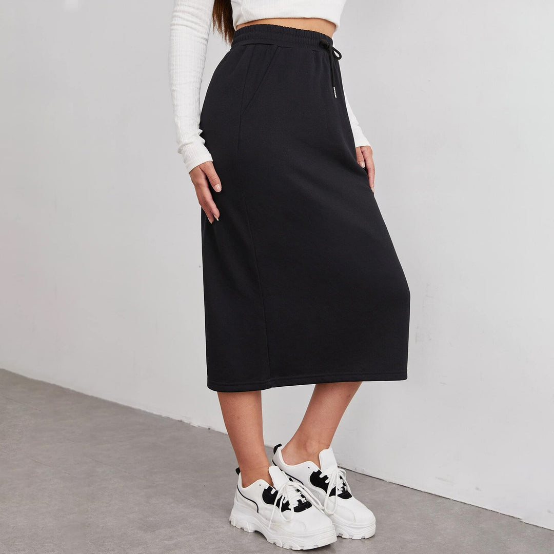 Midi jersey skirt for women with elastic waistband and welt pockets Lune London