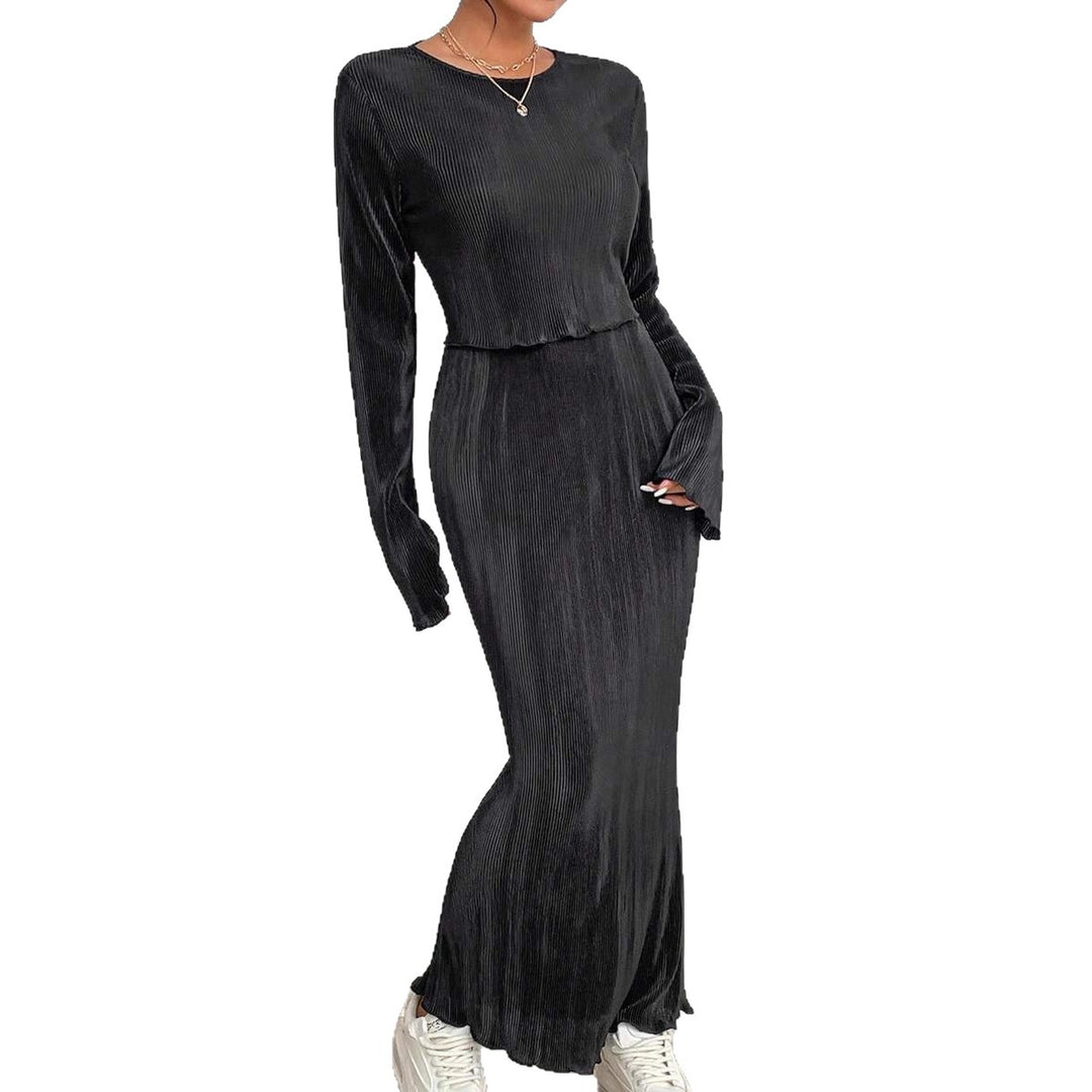 Robe maxi élégante et cintrée pour dames avec des manches longues Chic & Stil