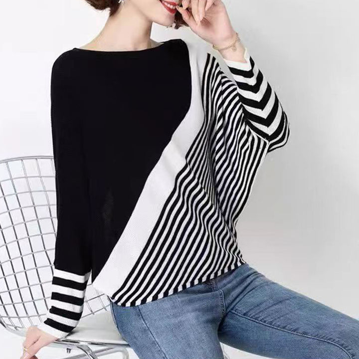 Fashionable knitted sweater for women with asymmetrical cut and graphic striped pattern Lune London