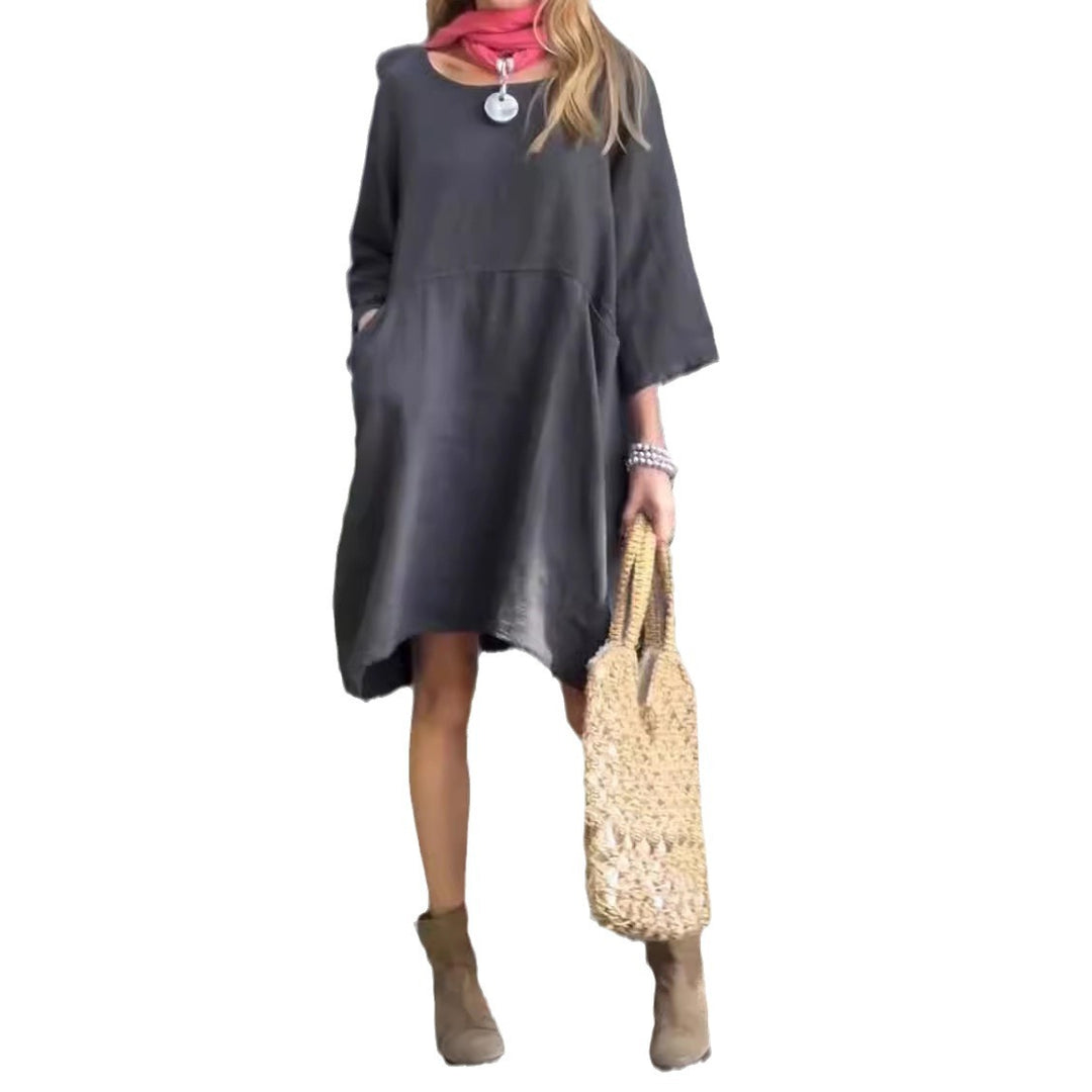 Casual linen dress for women with practical pockets and asymmetrical hem Lune London
