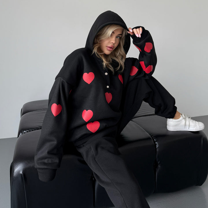 Women's fleece hooded tracksuit top with heart pattern and relaxed fit Lune London