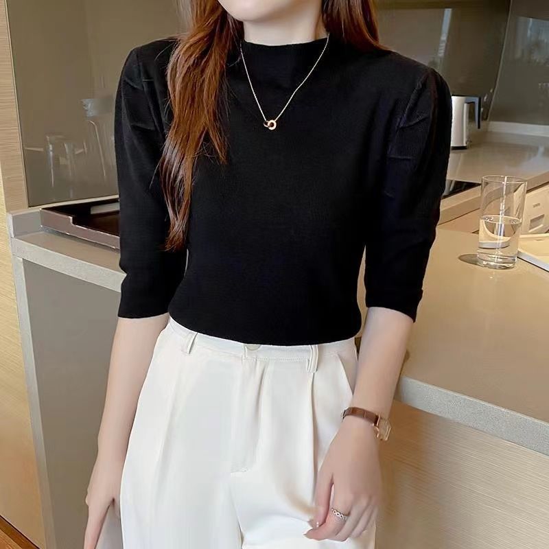 Haut élégant pour femmes avec des manches bouffantes et un tricot de haute qualité Chic & Stil