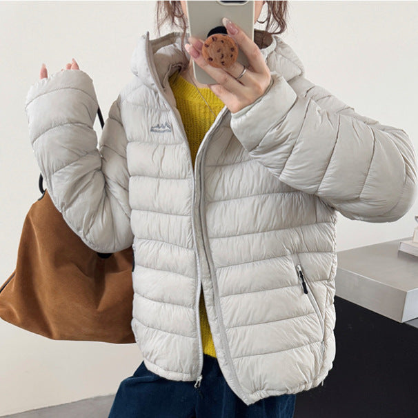 Ladies ultralight down jacket with removable hood and elastic hem Lune London