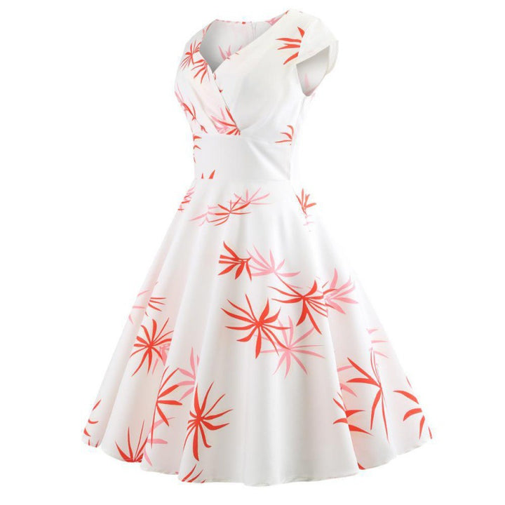 Robe à swing pour femmes avec un design enveloppant élégant et des accents floraux Chic & Stil