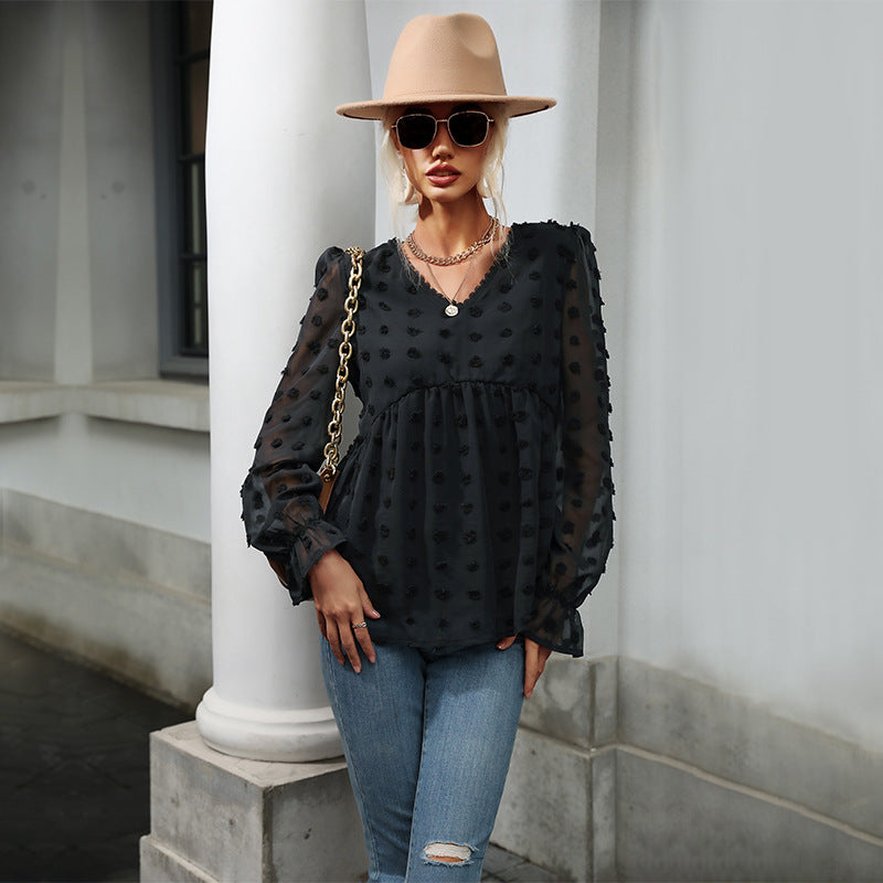 Elegant puff sleeve blouse for women with textured polka dot pattern Lune London
