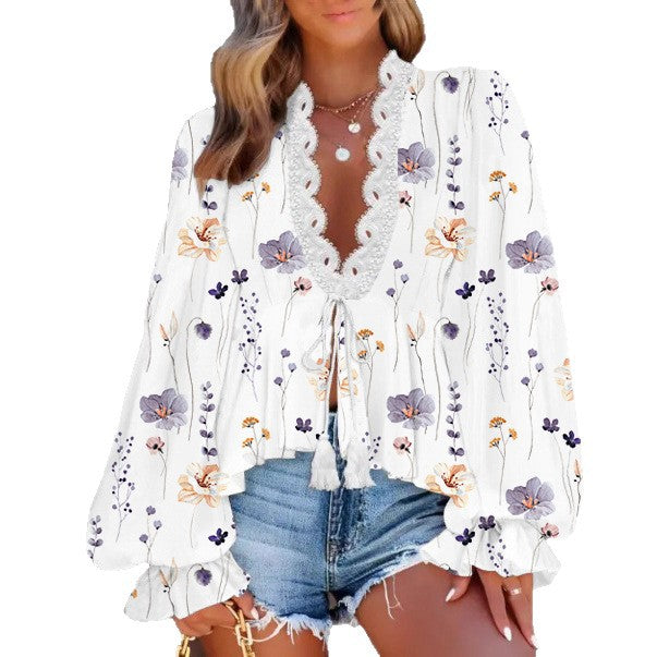 Lune London women's blouse with a playful floral print and lace edges