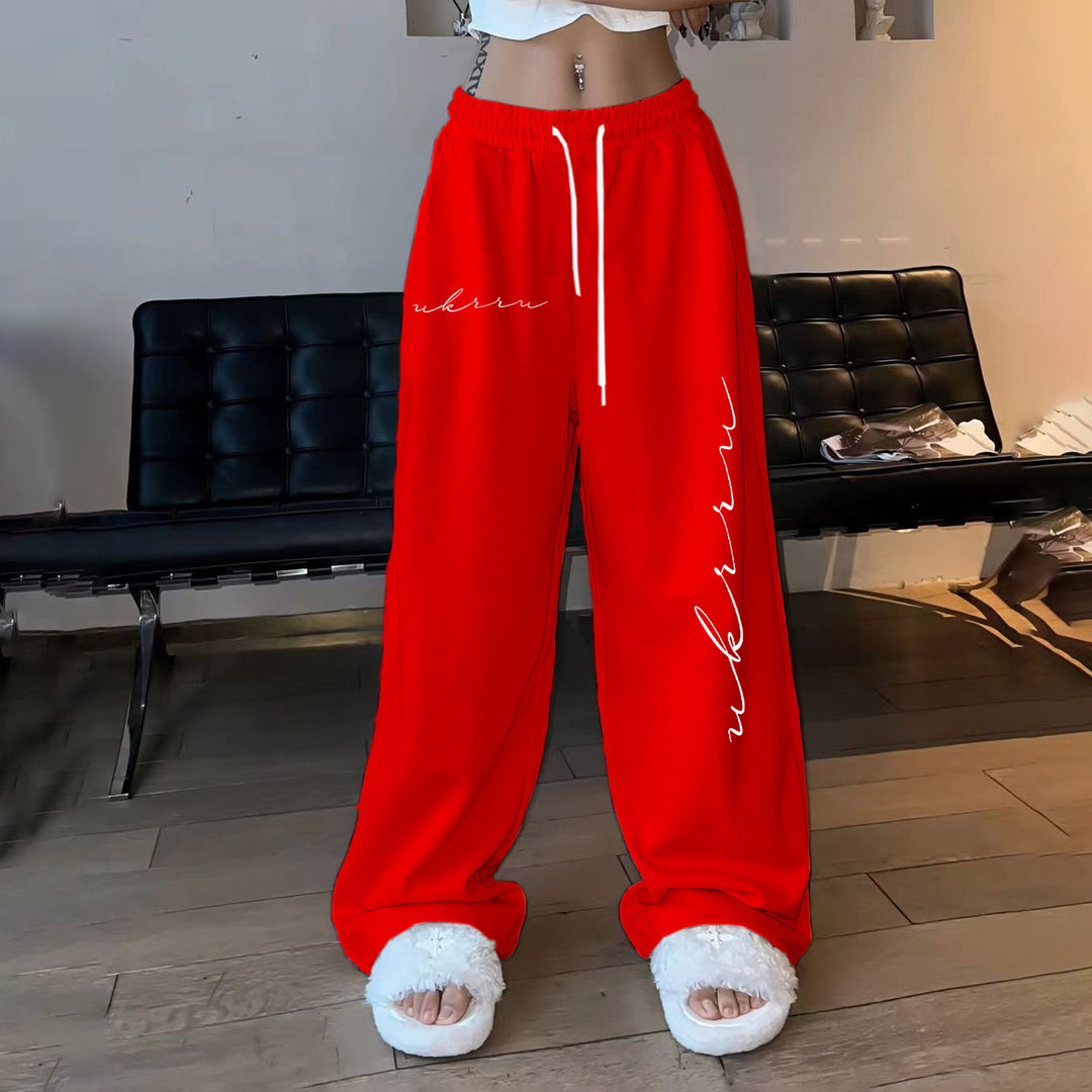 Women's loose leisure pants with elastic waistband and side pockets Lune London